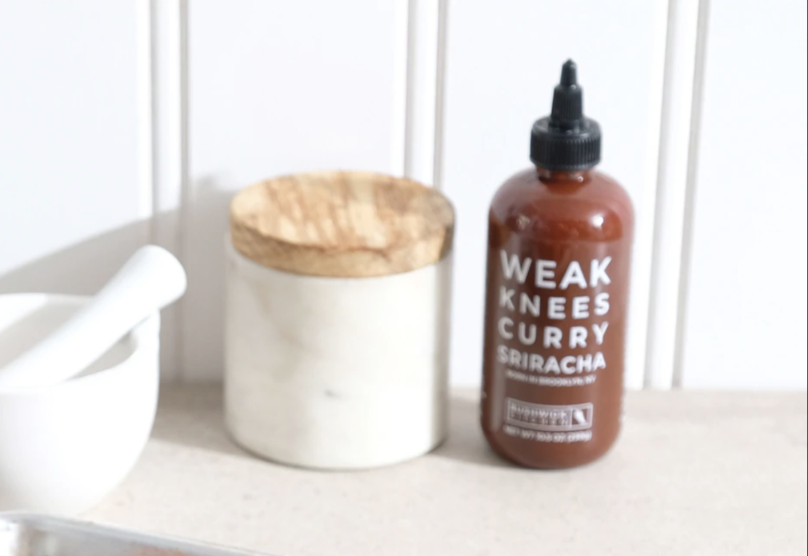 bottle of curry sriracha on counter