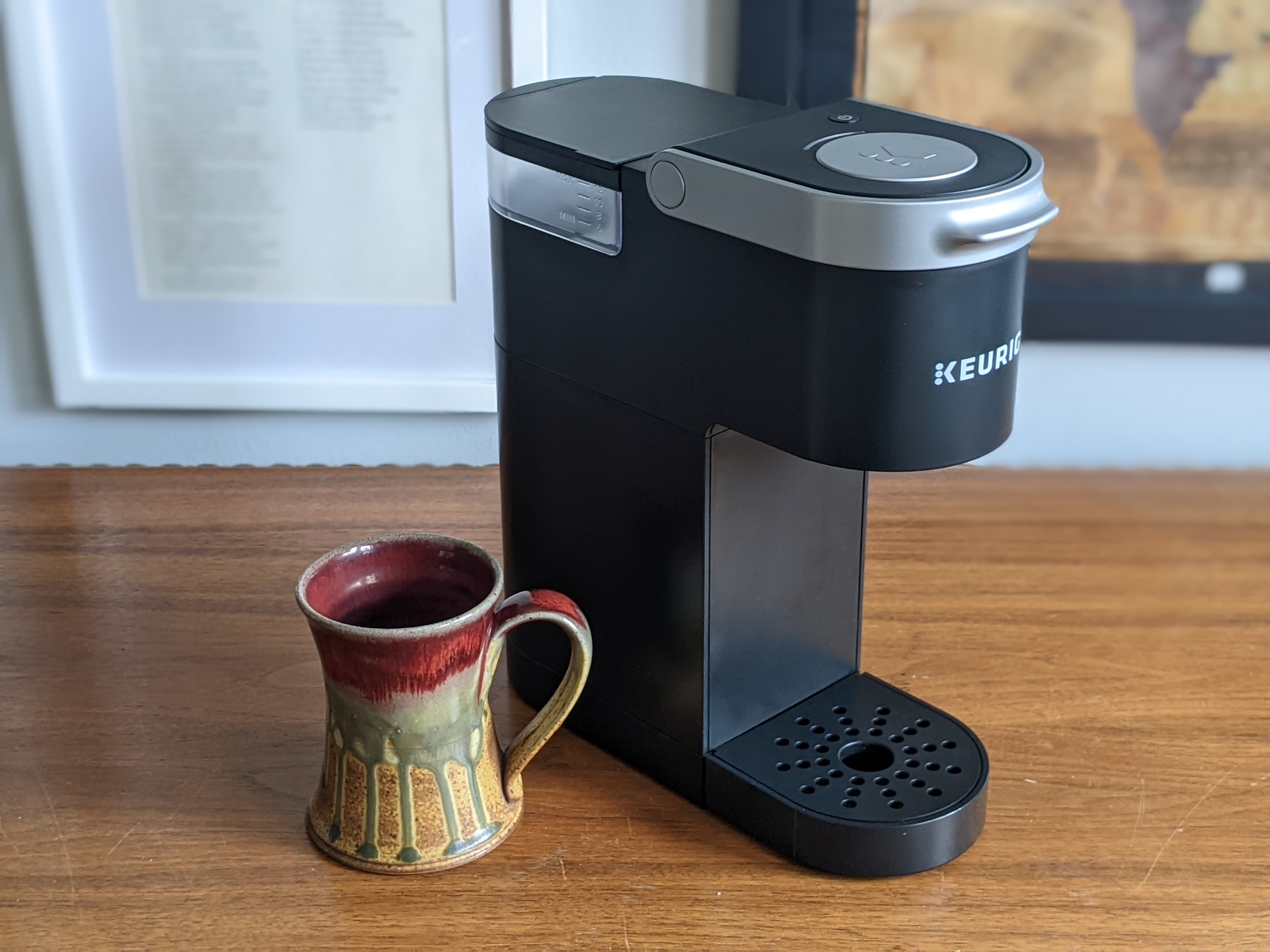 The Keurig K-Mini and a coffee mug.