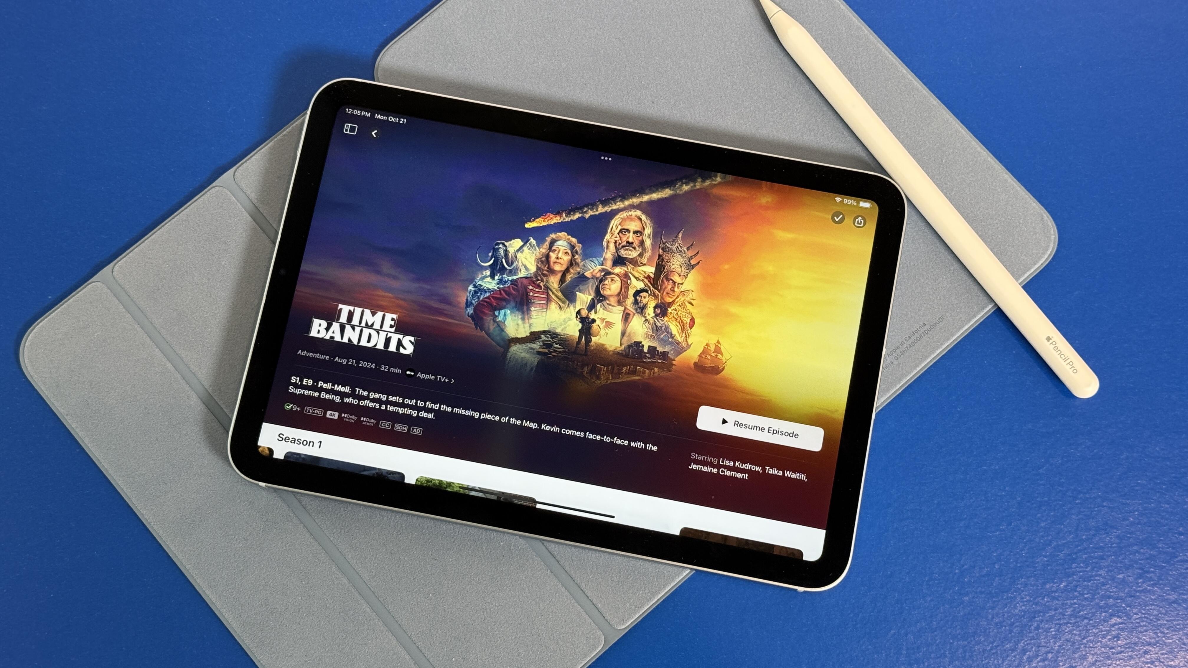 iPad Mini with Time Bandits on the screen, resting on a cover case with a Pencil Pro stylus to the right