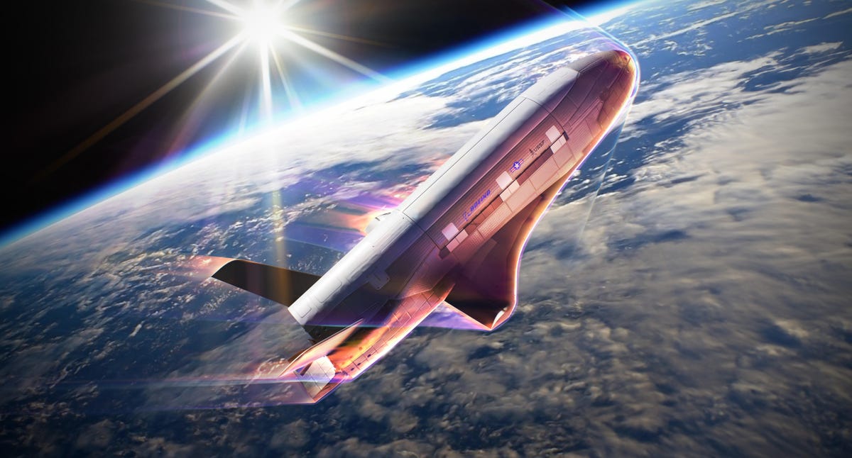 Artist rendering of the X-37B spaceplane executing an aerobraking maneuver in Earth orbit