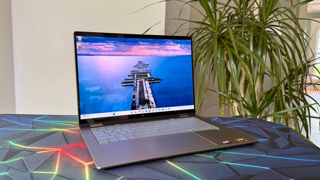 HP OmniBook X Flip 14 2-in-1 on a tablet next to a house plant