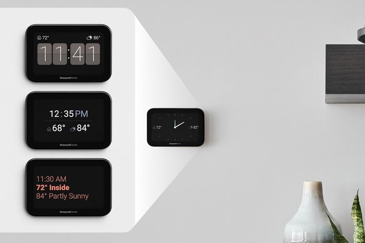 The X8S thermostat showing different screen options like a clock and temperatures.