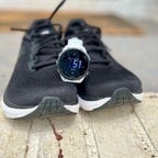 Garmin Forerunner 165 on running shoes