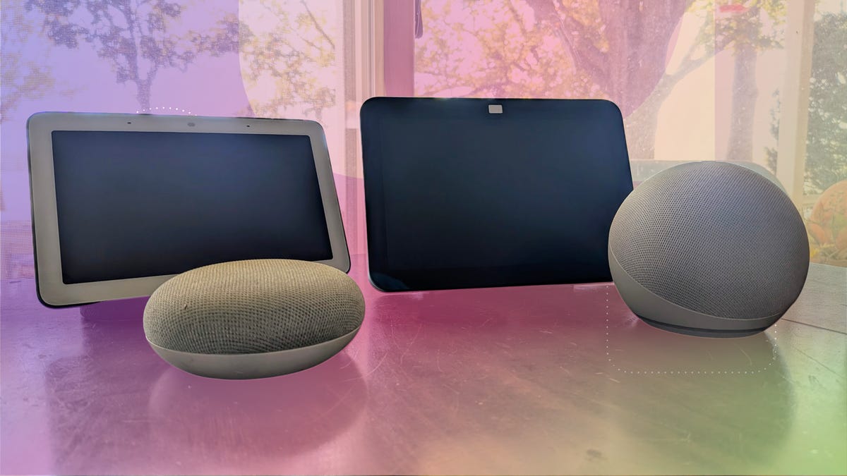 Google Nest Hub and Nest Mini on a table with the Amazon Echo Show 8 and Echo Dot.