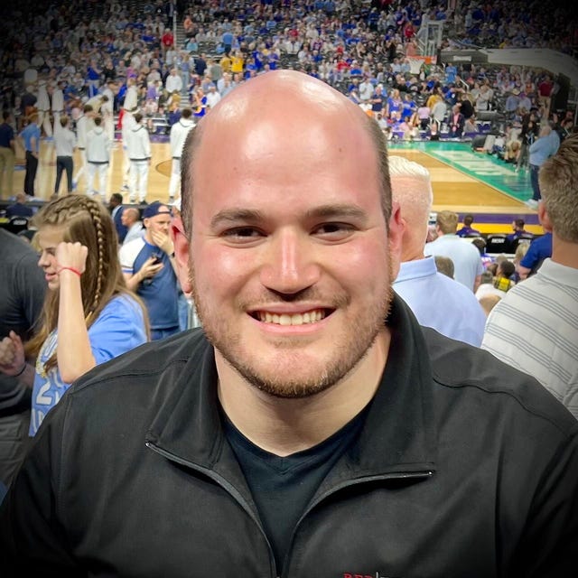 Headshot of Eli Blumenthal