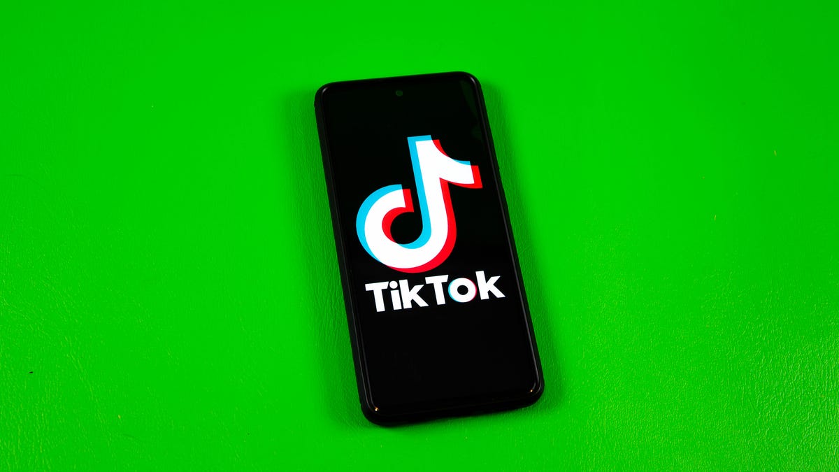 TikTok logo on a phone screen