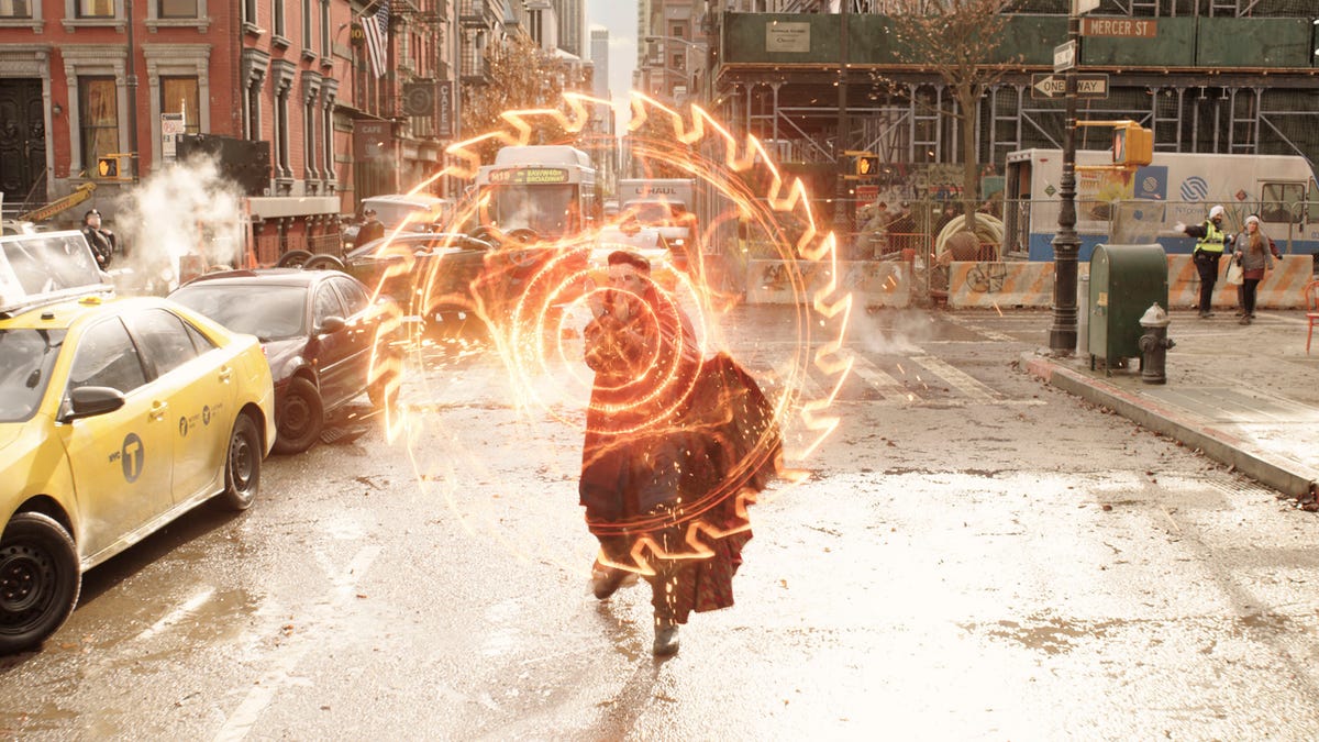 Benedict Cumberbatch makes magic shapes in a New York street in Marvel's Doctor Strange in the Multiverse of Madness.