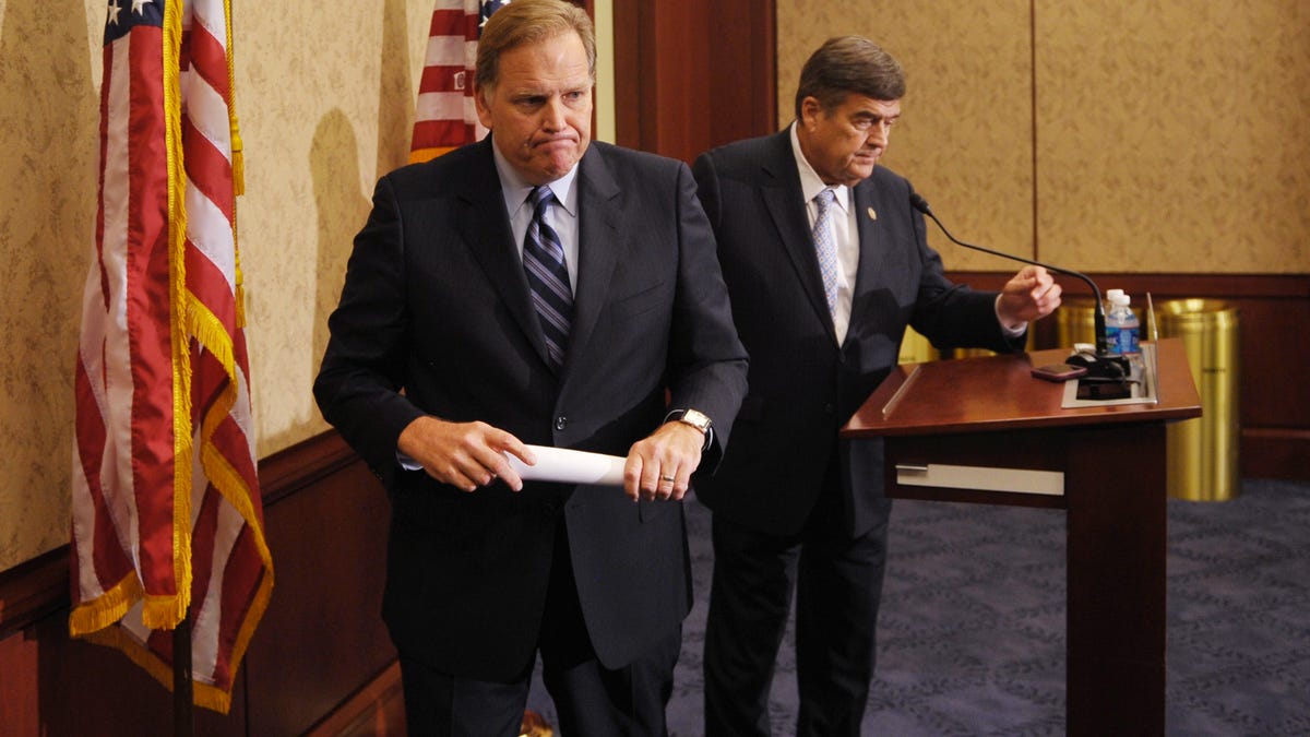 House Intelligence chairman Mike Rogers, CISPA's author (left), says allowing U.S. companies to share types of data with the National Security Agency will allow them to fend off "cyber looters."