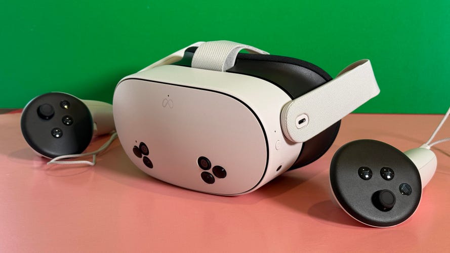 The Meta Quest 3S VR headset and controllers with a pink and green background