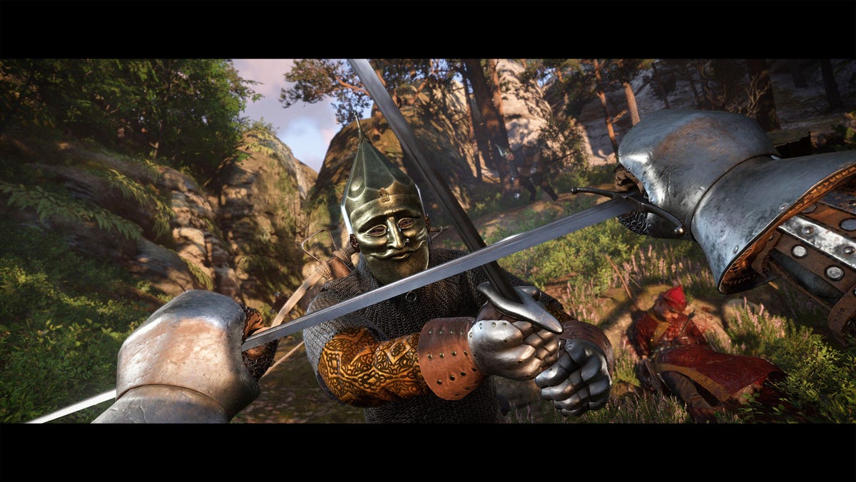In first-person view, two armored hands hold up a sword to block a blow from an armored opponent's sword.