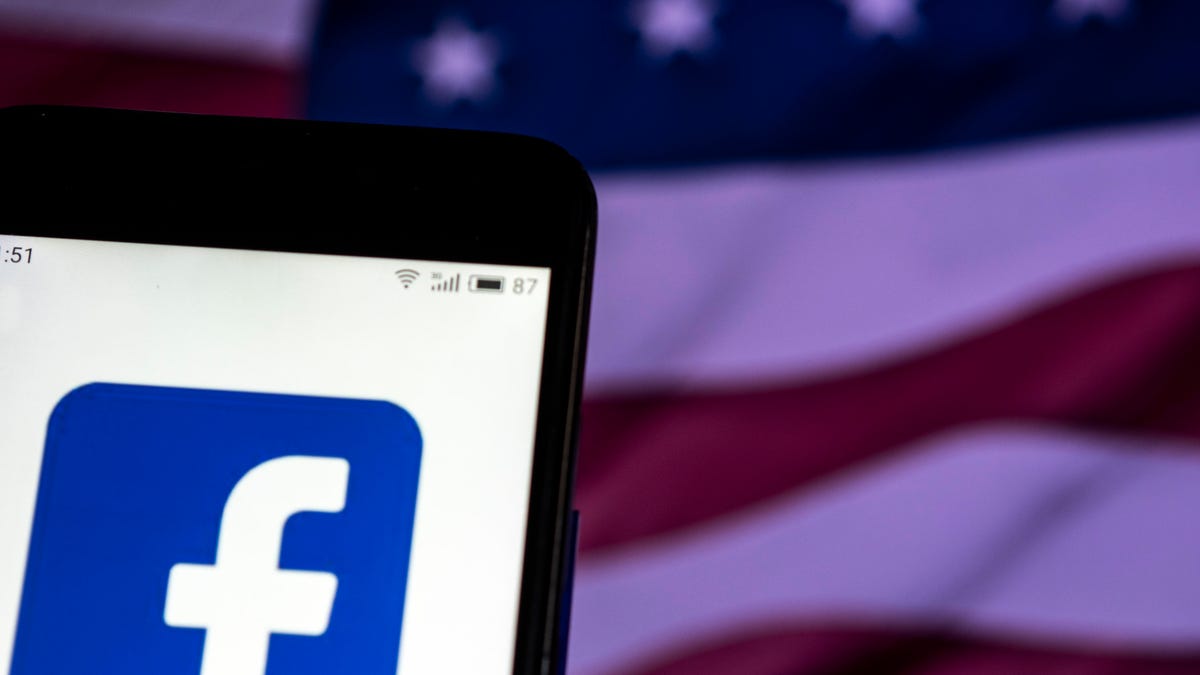 FACEBOOK logo seen displayed on smart phone