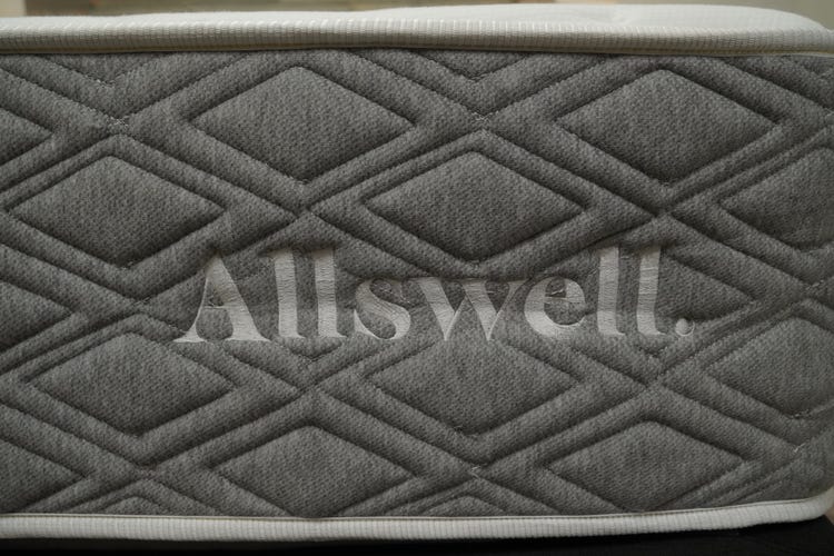Close up of the Allswell logo on the Allswell Luxe mattress