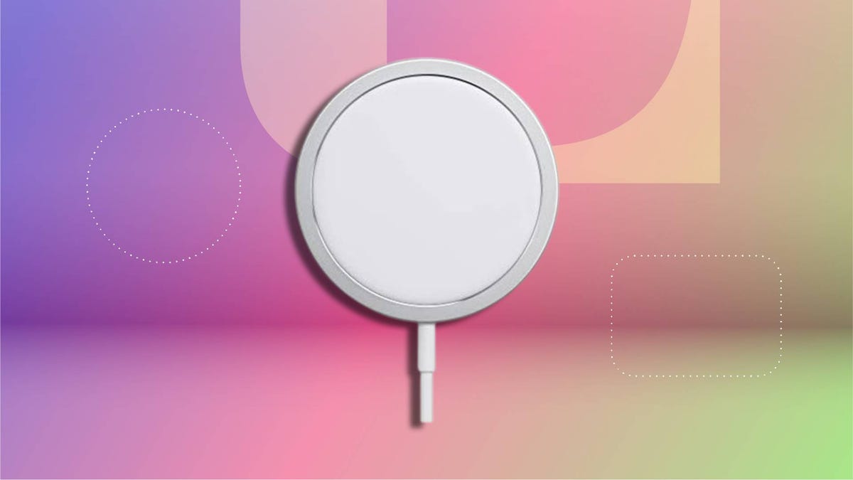 A MagSafe charger on a bright background.