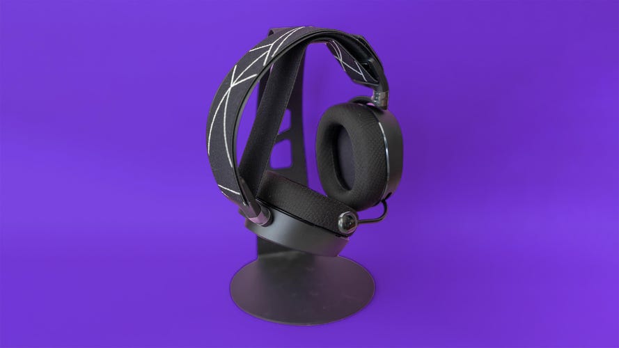 SteelSeries Arctis 9 hanging on a headset stand