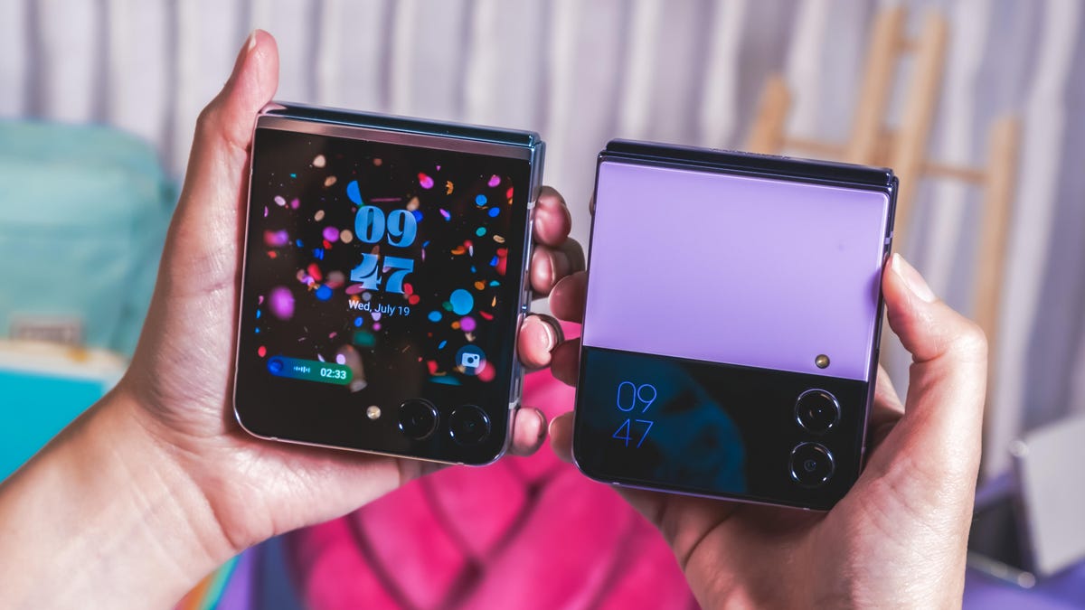 Samsung's Galaxy Z Flip phones being held next to each other