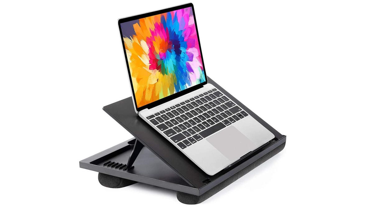 Huanuo's adjustable lap desk holding a laptop