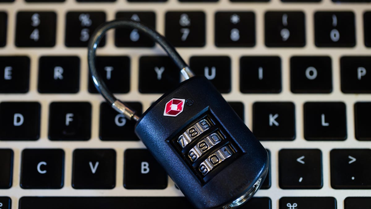 Padlock on computer keyboard.