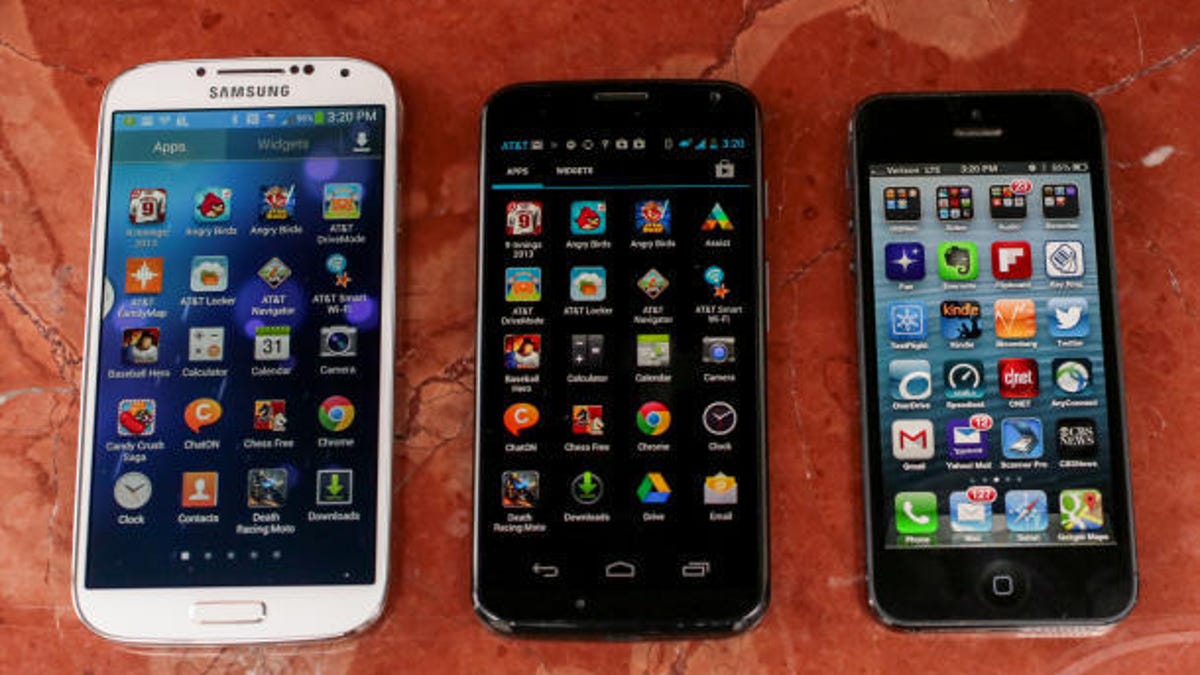 The Samsung Galaxy S4 (left) offers a much bigger screen than the iPhone 5 (right), and positively dwarfs my iPhone 4S (see below).