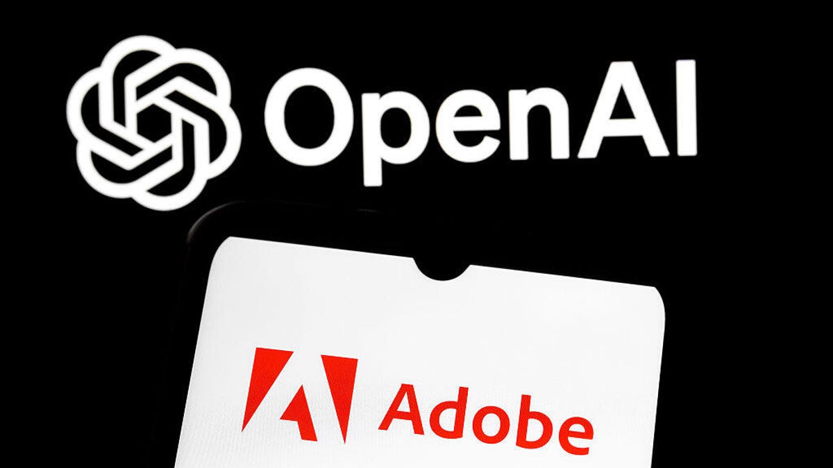 Adobe logo on smartphone in front of a black background with the OpenAI logo.