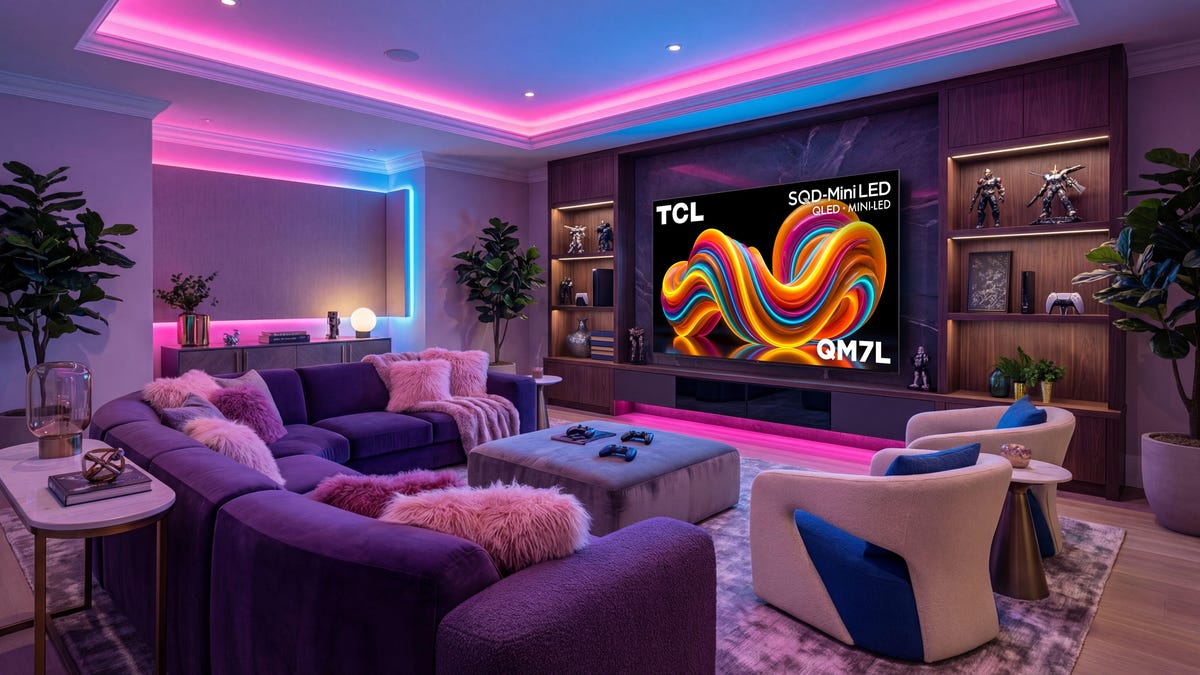 The TCL QM7L TV in a living room setting.