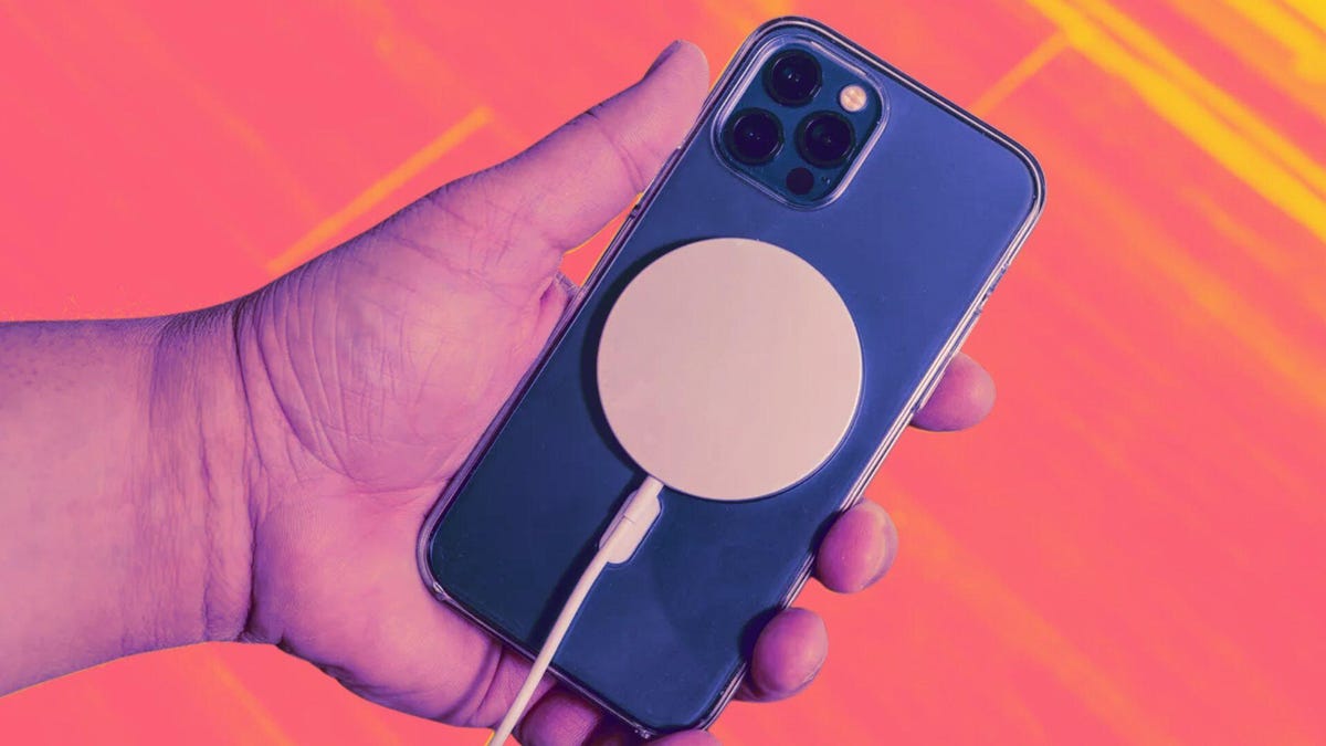 An iPhone with a MagSafe charger