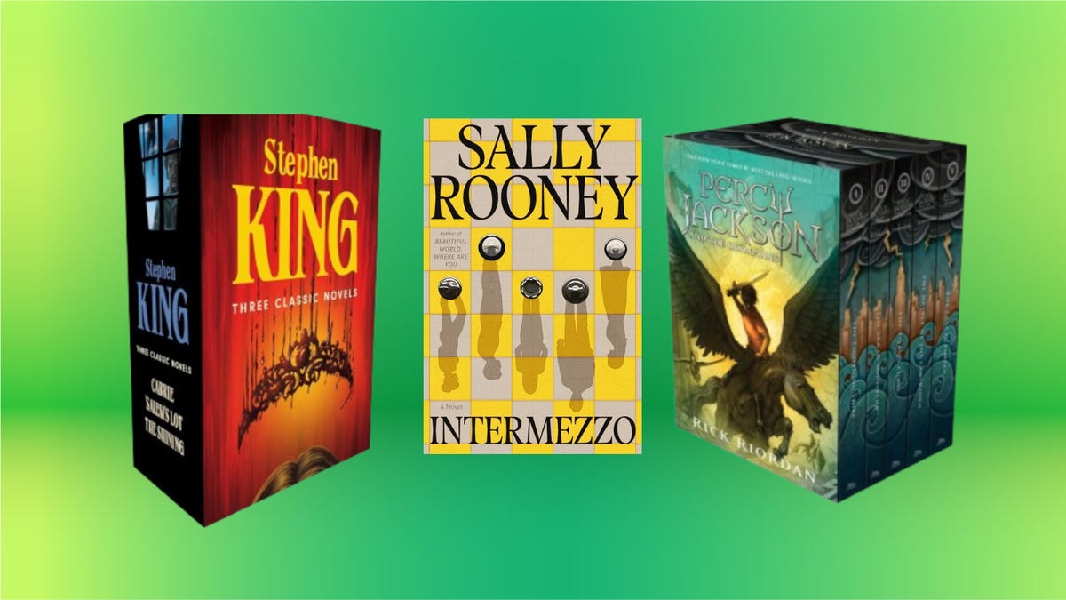 Boxed set of Stephen King books next to Sally Rooney's Intermezzo and Rick Riordan's Percy Jackson boxed set, displayed against a green background
