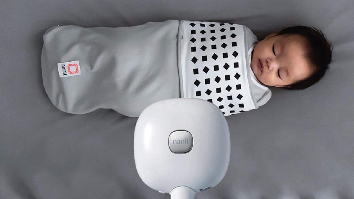 picture of a baby monitor overlooking a sleeping baby