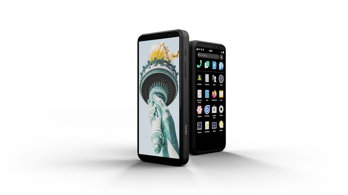 Two Liberty Phones side by side, one with a home screen, the other with a photo of the Statue of Liberty's torch