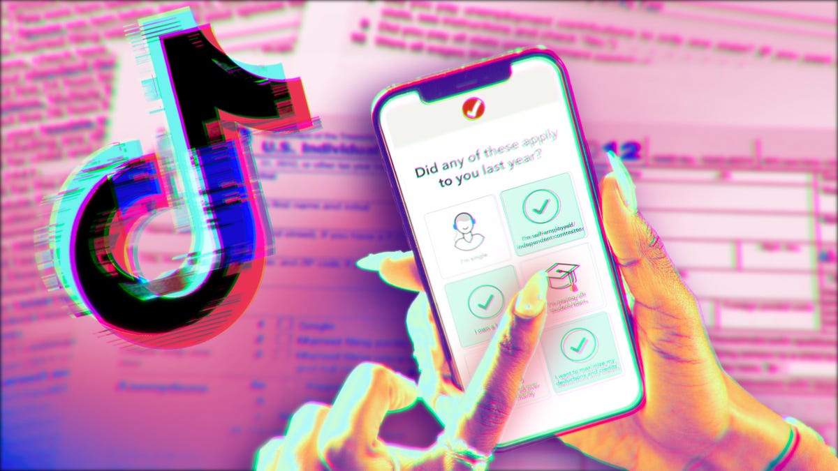 A smartphone with tax paperwork in the background