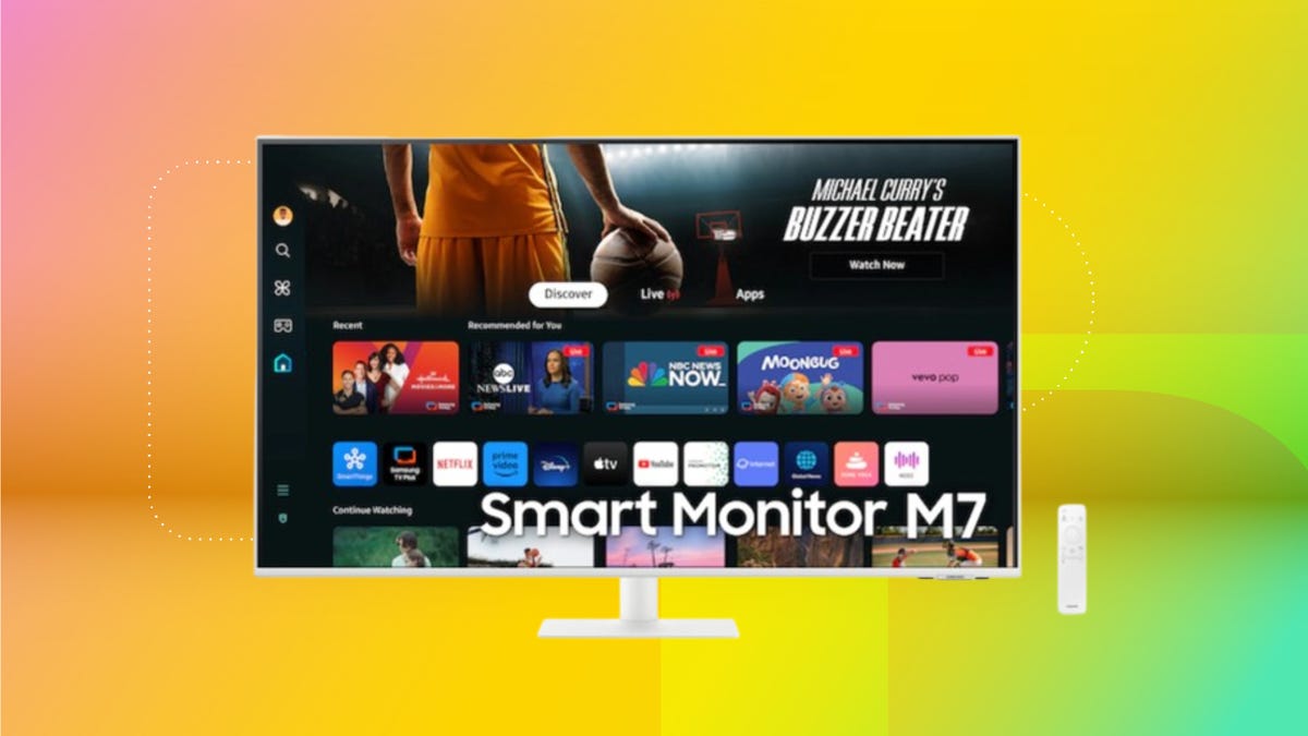 white Samsung smart monitor with streaming menu wallpaper against peach, orange, yellow and green gradient background