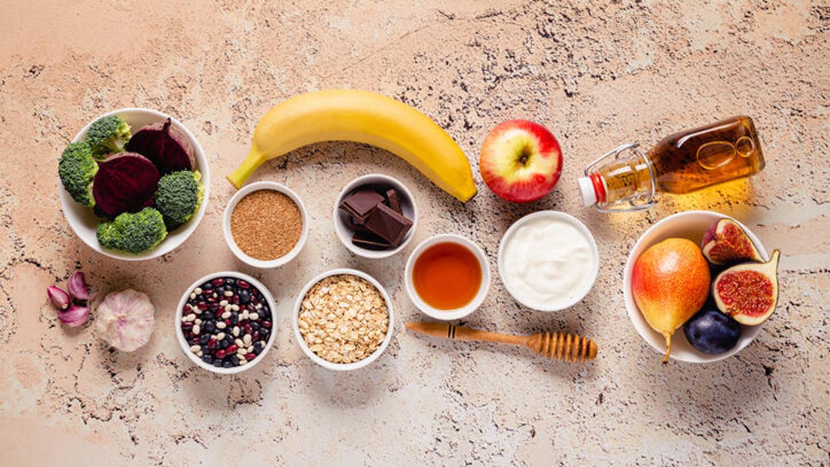 Healthy foods gathered on a concrete background.