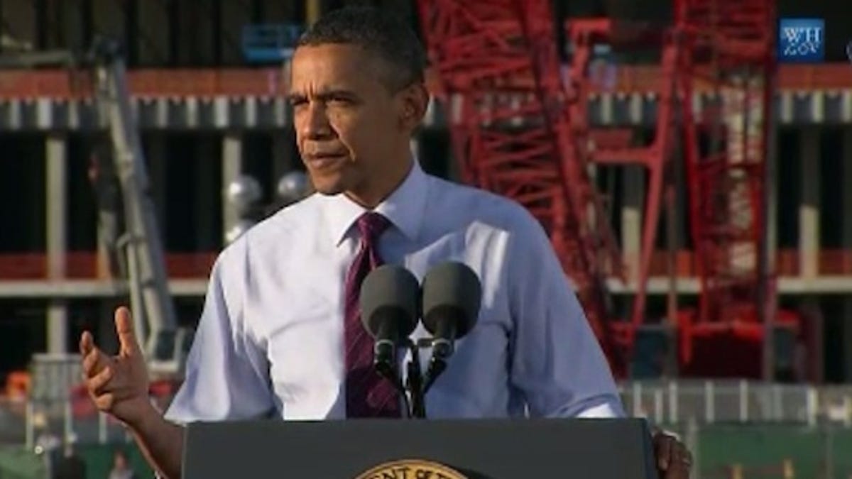 President Obama speaking at Intel's Chandler, Arizona chip plant, now under construction. 'I'm here because the factory being built behind me is an example of an American that is within our reach...An America where we make stuff and sell stuff all over the world.'