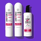 three bottles of hair products