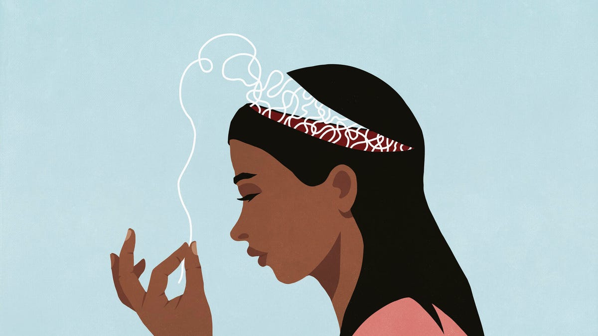 Woman with an open mind that she is pulling a string from