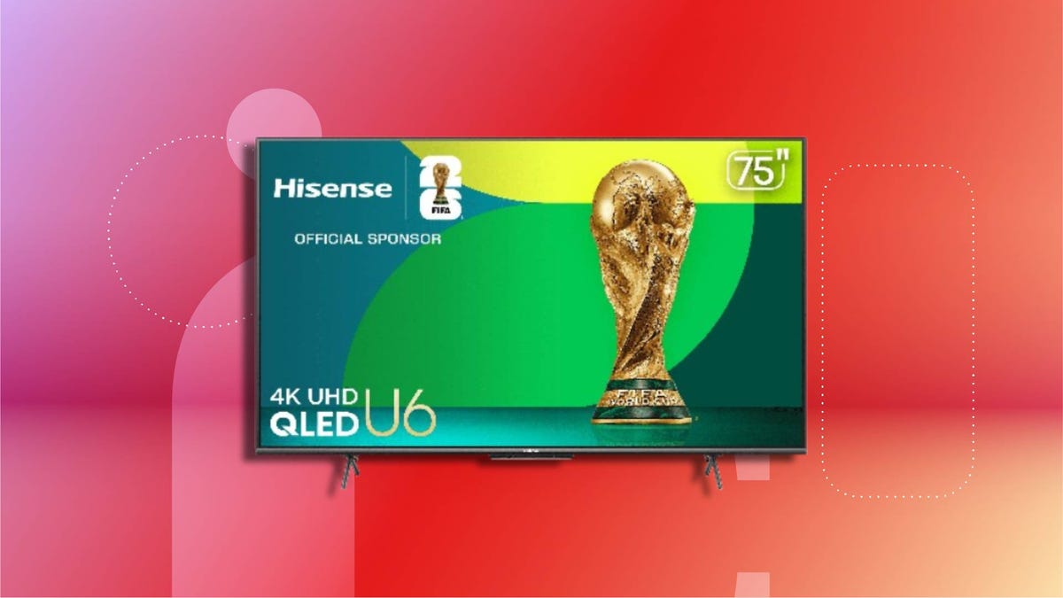 Hisense 75-inch 4K UHD QLED U6 television displaying FIFA World Cup promotional graphic with official trophy, sponsor text and logo. Set against a red and purple gradient background.