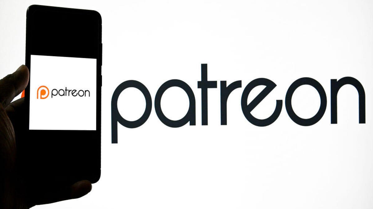Patreon logo is shown on a smart phone and next to it on a white background.