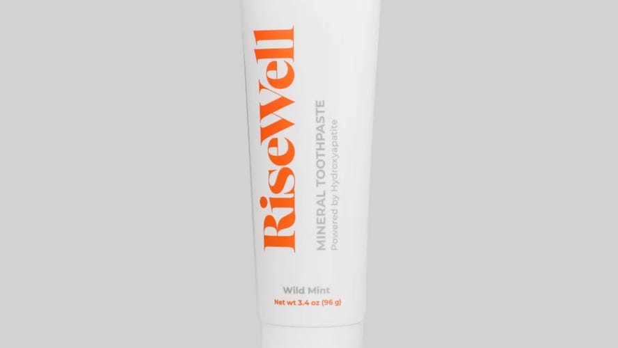 RiseWell Mineral Toothpaste over a light grey background.
