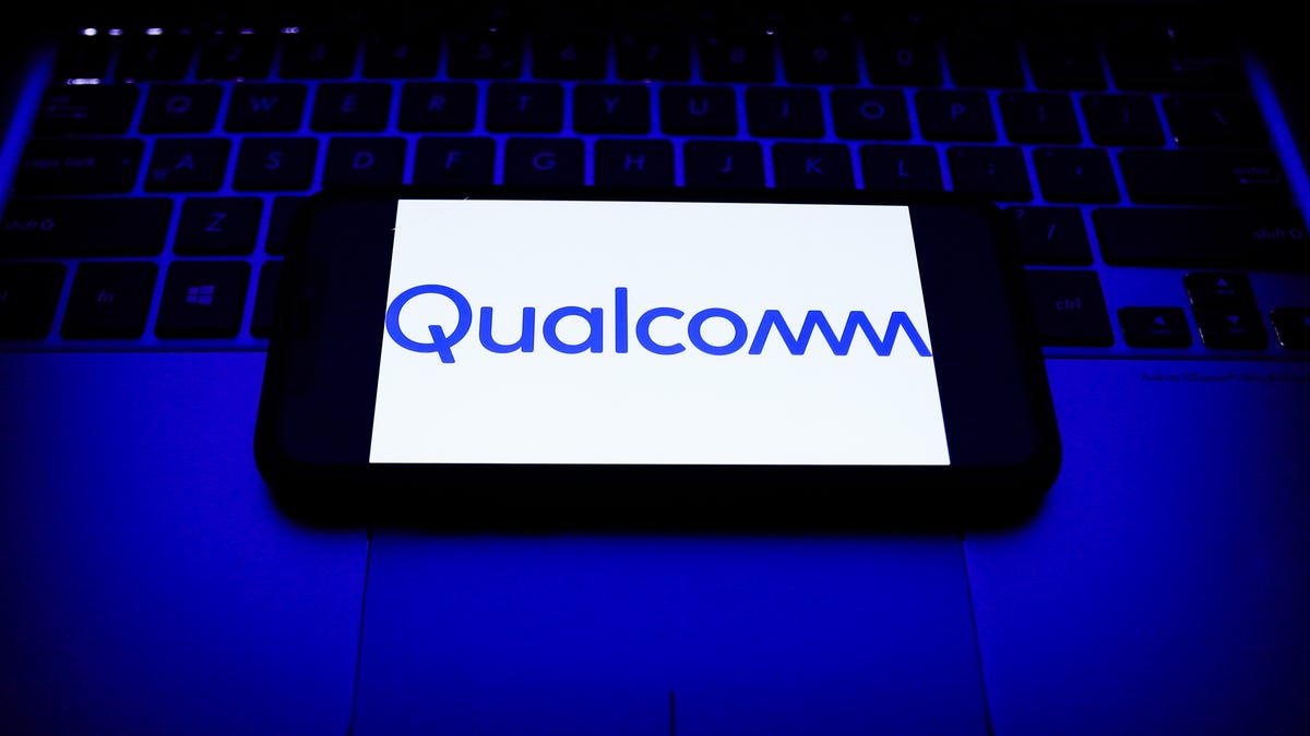 Qualcomm's wordmark, shown on a smartphone.