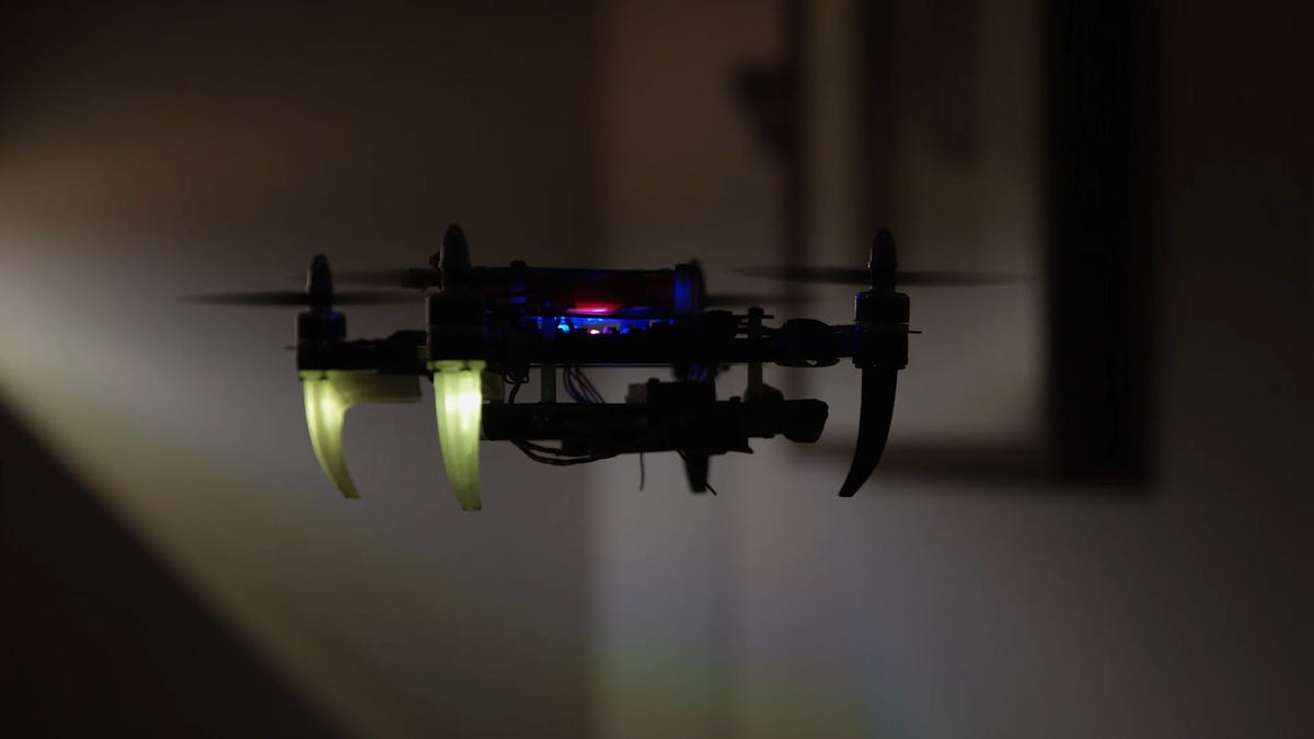 alarm-comdronehoveringbacklit.jpg