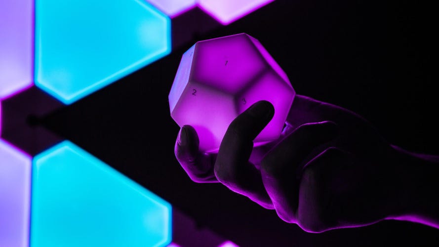 The glowing purple Nanoleaf dodecahedron remote.