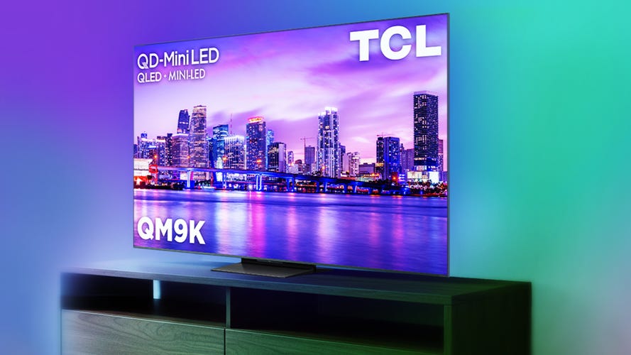 TCL-QM9K TV sits in a table.