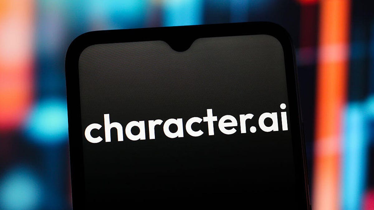 The character.ai logo is seen on a black screen on a phone.