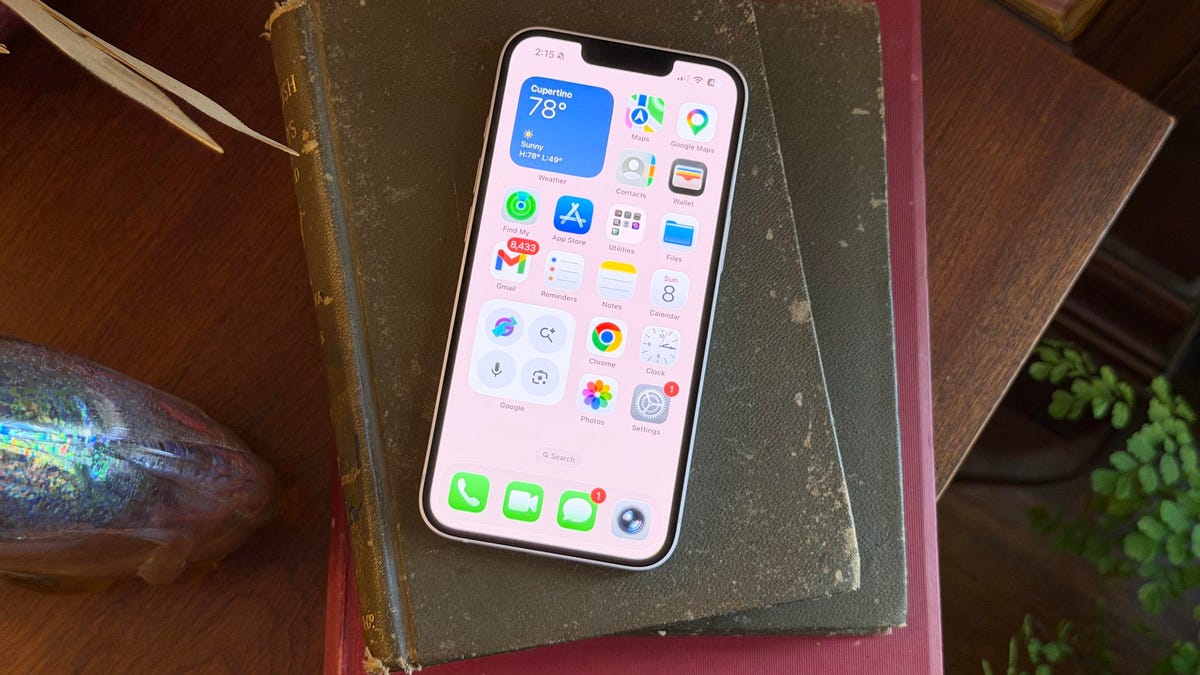 The iPhone 17E on a stack of books