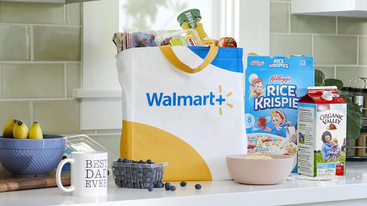 A shopping bag with Walmart+ on the front in a kitchen