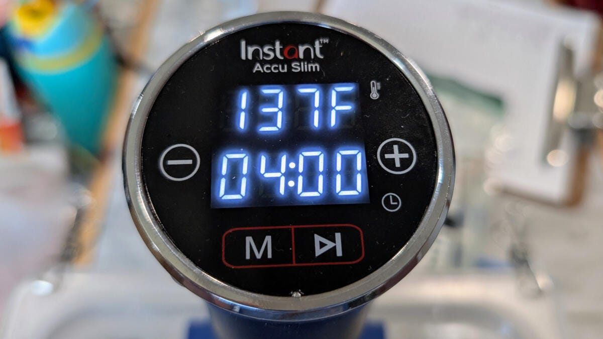 A sous vide machine set to 137 degrees Fahrenheit.