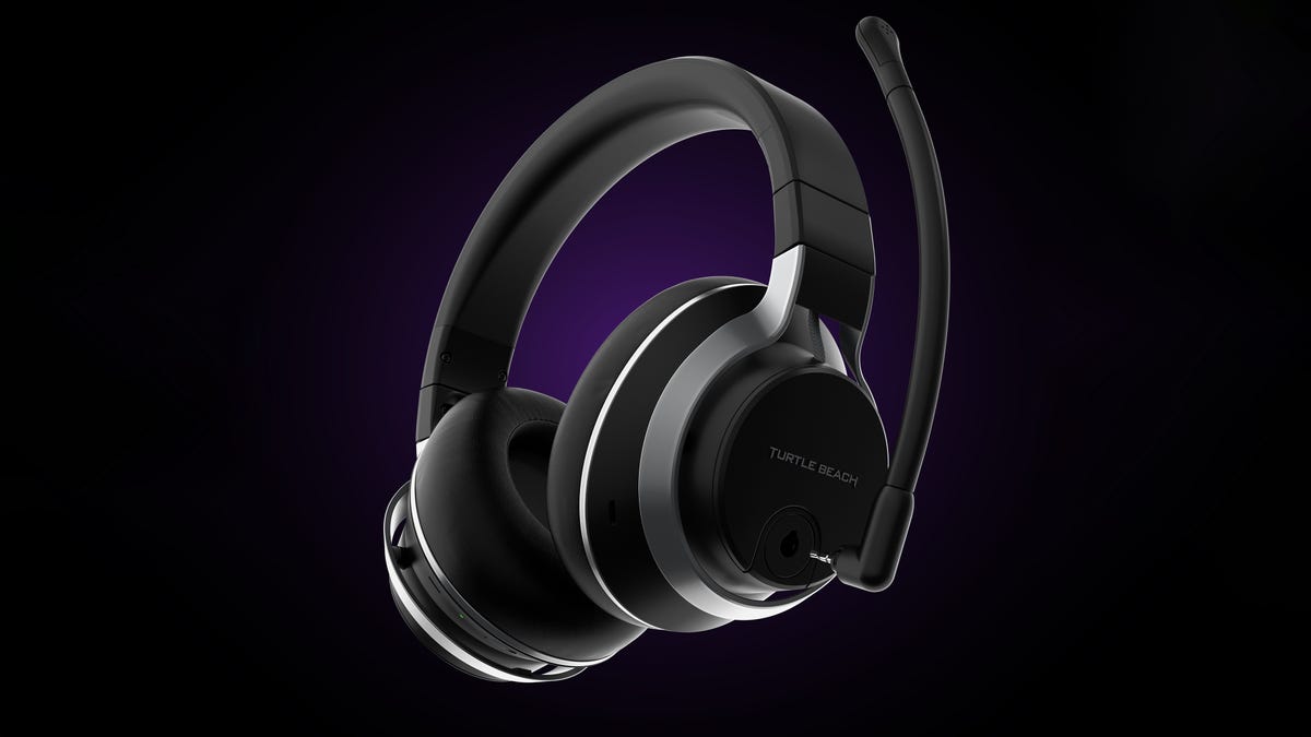 Product shot of the headset with the detachable microphone detached on a purple and black background