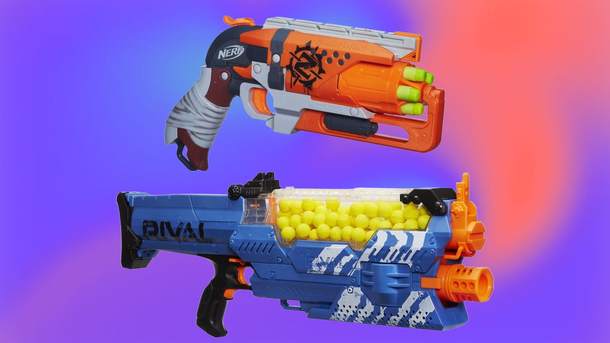 Nerf Zombie Blaster and Nerf Rival Nemesiso on blue/orange CNET background