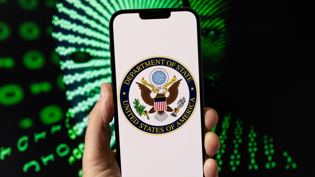 The US State Department building in Washington, DC, with a sign out front reading "Department of State"