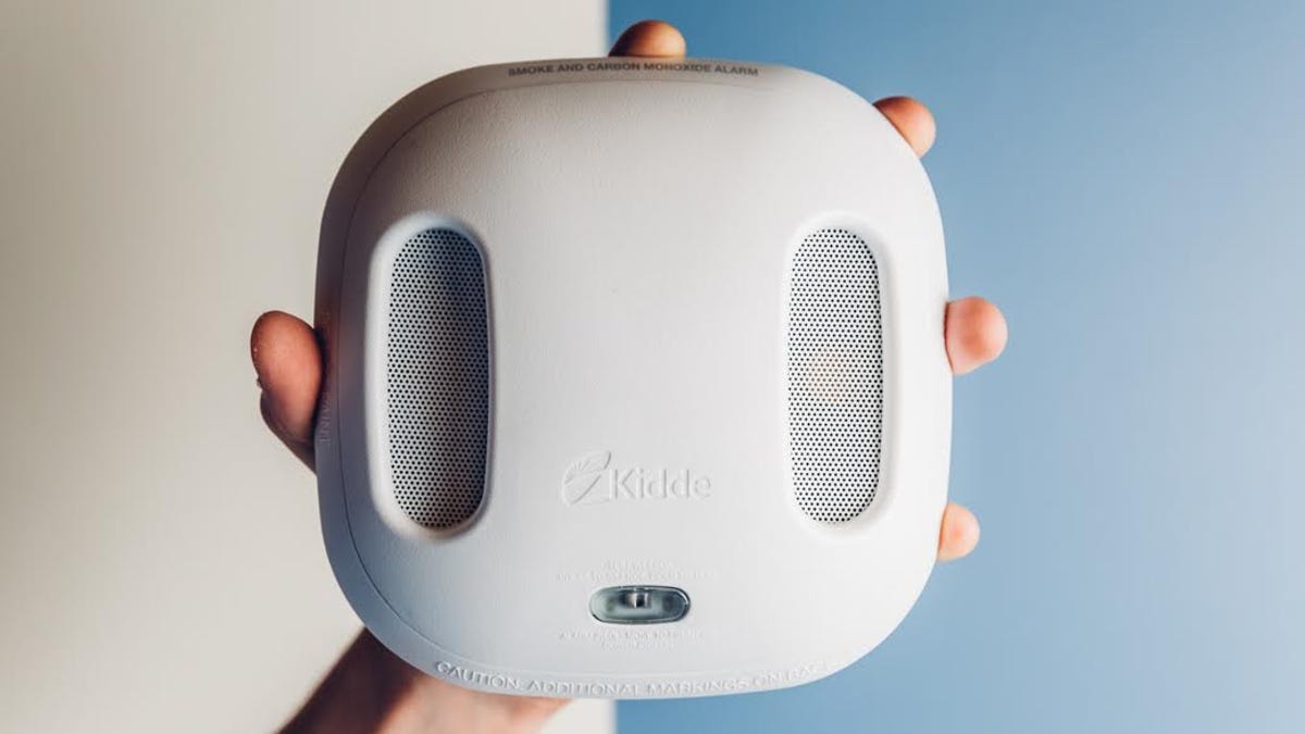 smoke detector in hand