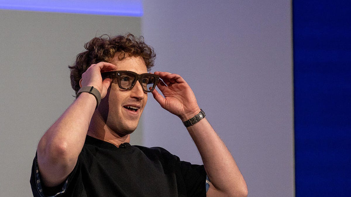 Mark Zuckerberg, chief executive officer of Meta Platforms Inc., wears a pair of Meta Ray-Ban Display AI glasses during the Meta Connect event